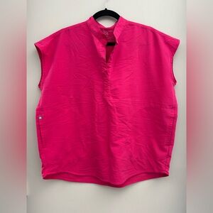 FIGS Women's Rafaela Oversized Scrub Top in shocking pink